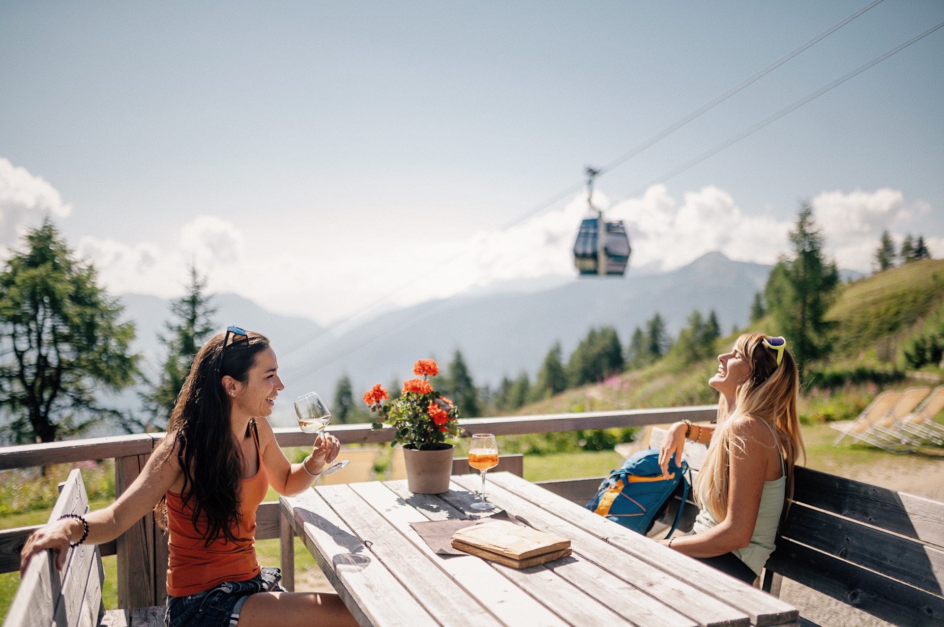 Two women enjoying an aperitif in the South Tyrolean mountains - Hotel Wieser