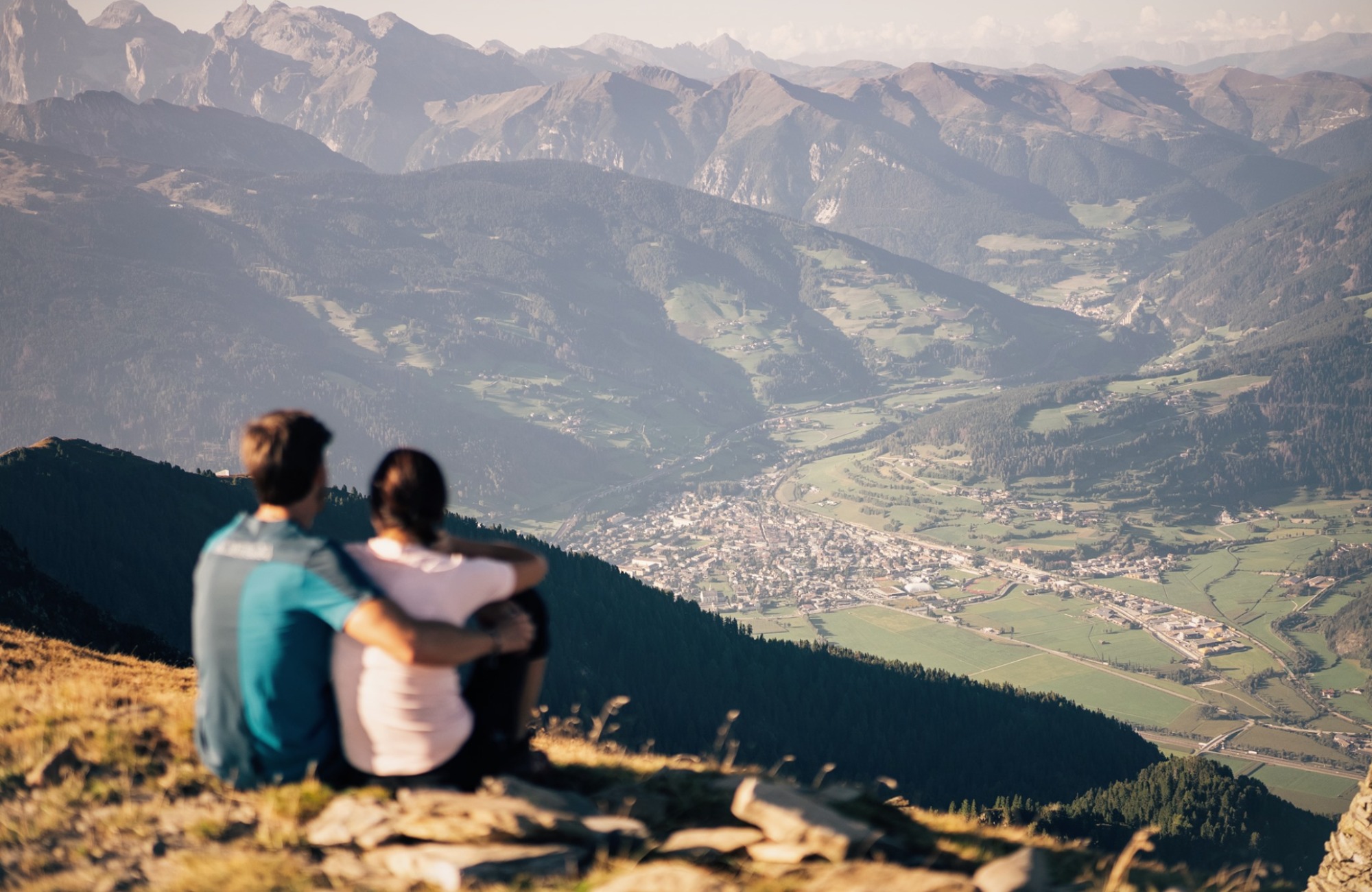 A couple looks out over the mountains of South Tyrol - Hotel Wieser